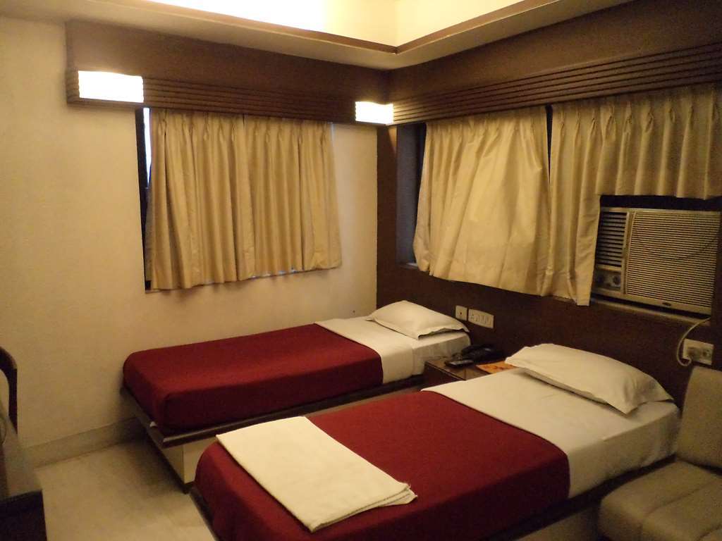 Hotel Aston Kalkata Pokoj fotografie